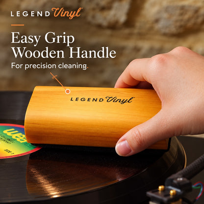 Large velvet dust pad of the LV34 brush resting on a vinyl record