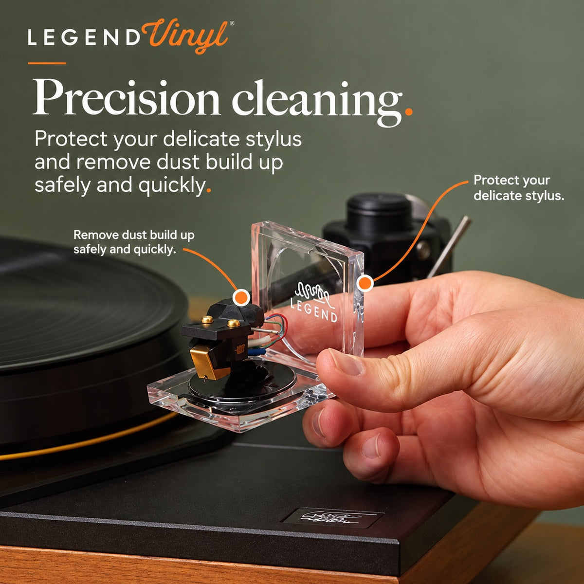 Stylus being lowered onto Legend Vinyl cleaning gel beside a turntable