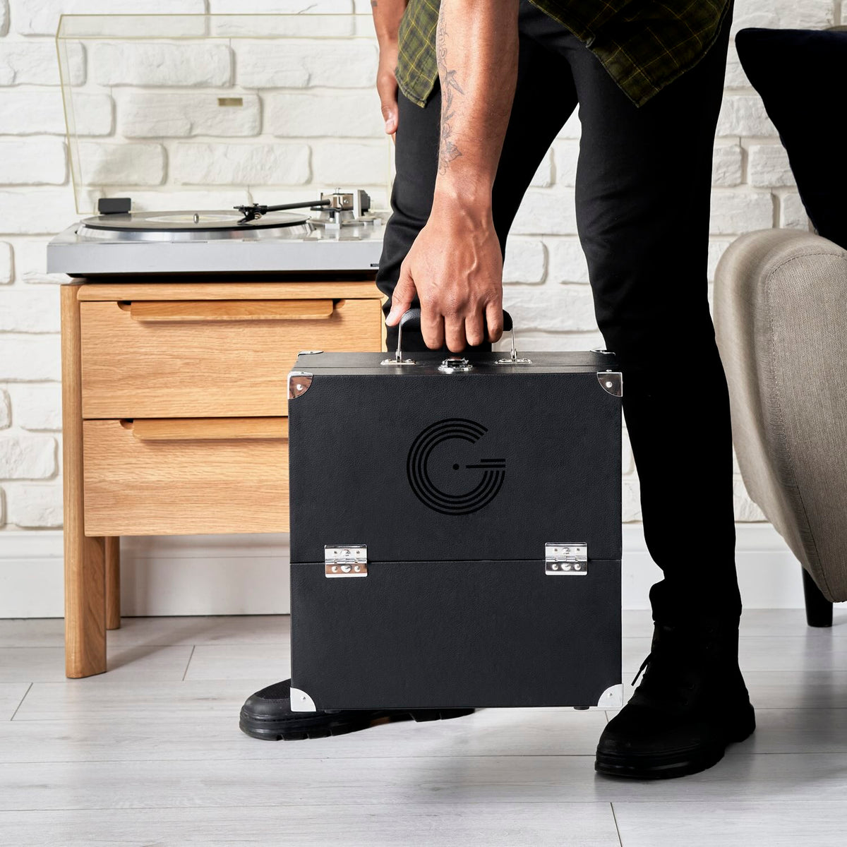 Legend Vinyl vinyl record case beside a turntable, lid open, holding a collection of 12-inch records