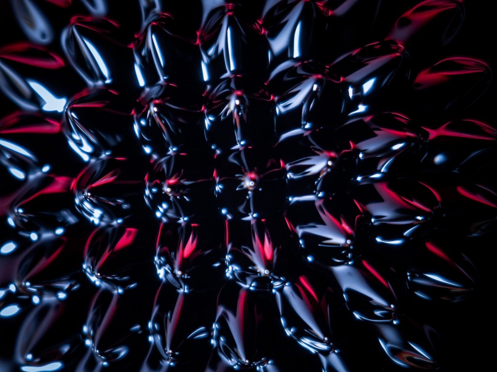 Close up shot of ferrofluid. Ferrofluids were invented in 1963 by NASA to create liquid rocket fuel that could be drawn toward a fuel pump in a weightless environment by applying a magnetic field.